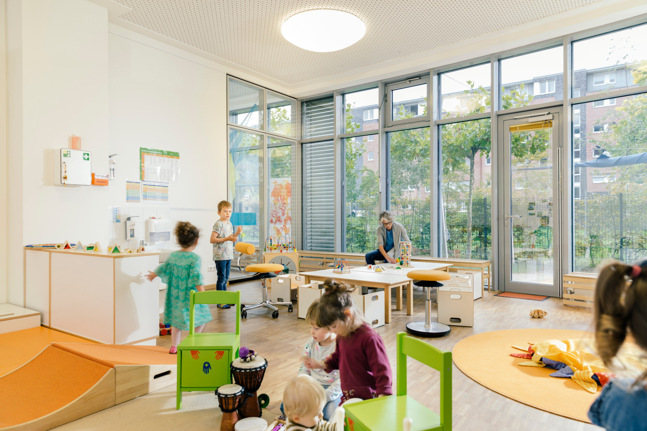 Play and learning room with kids in Daycare center, Pre-school or Kindergarten, Cologne, NRW, Germany